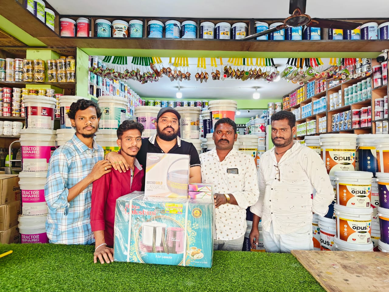 SSV Agencies team group photo in store